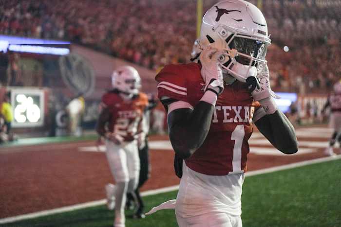 Xavier Worthy jogs off of the field at DKR